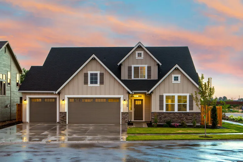 A two-story house at sunset